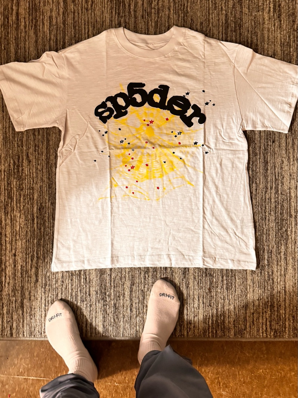 Sp5der White Graphic Tee with Yellow Starburst